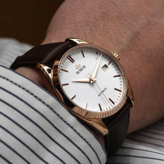 Rumoe Nobel Royal with a brown leather strap on the wrist