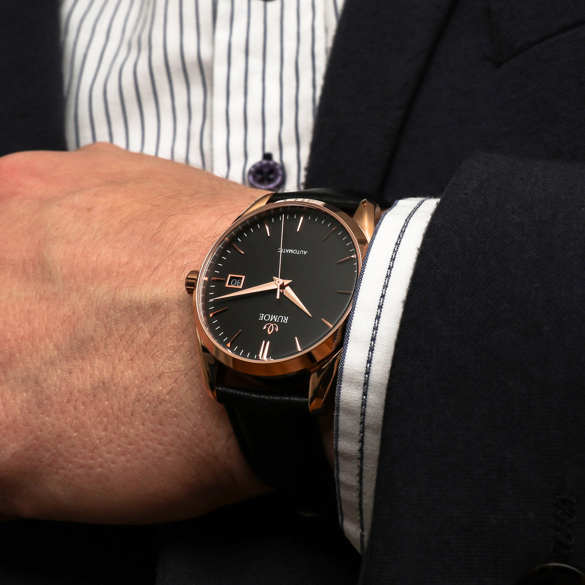 Dalum Black / Rose Gold on the wrist with black calf leather strap