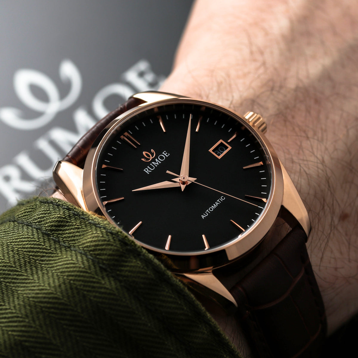 Blista Black / Rose Gold on the wrist with brown crocodile-pattern calf leather strap